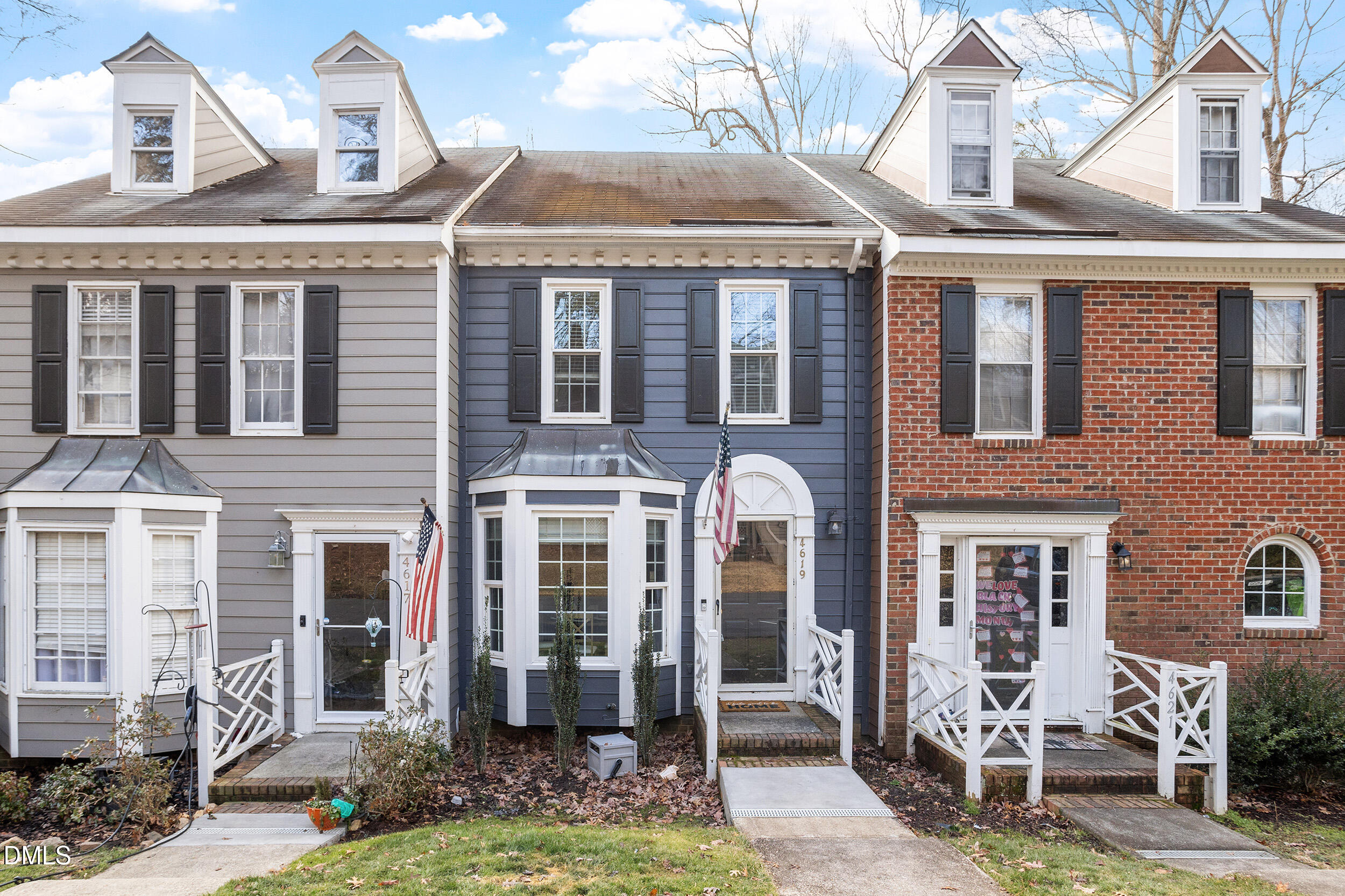 4619 Hershey Court Raleigh, NC 27613 - Photo 1 of 43 a front view of a house with a yard