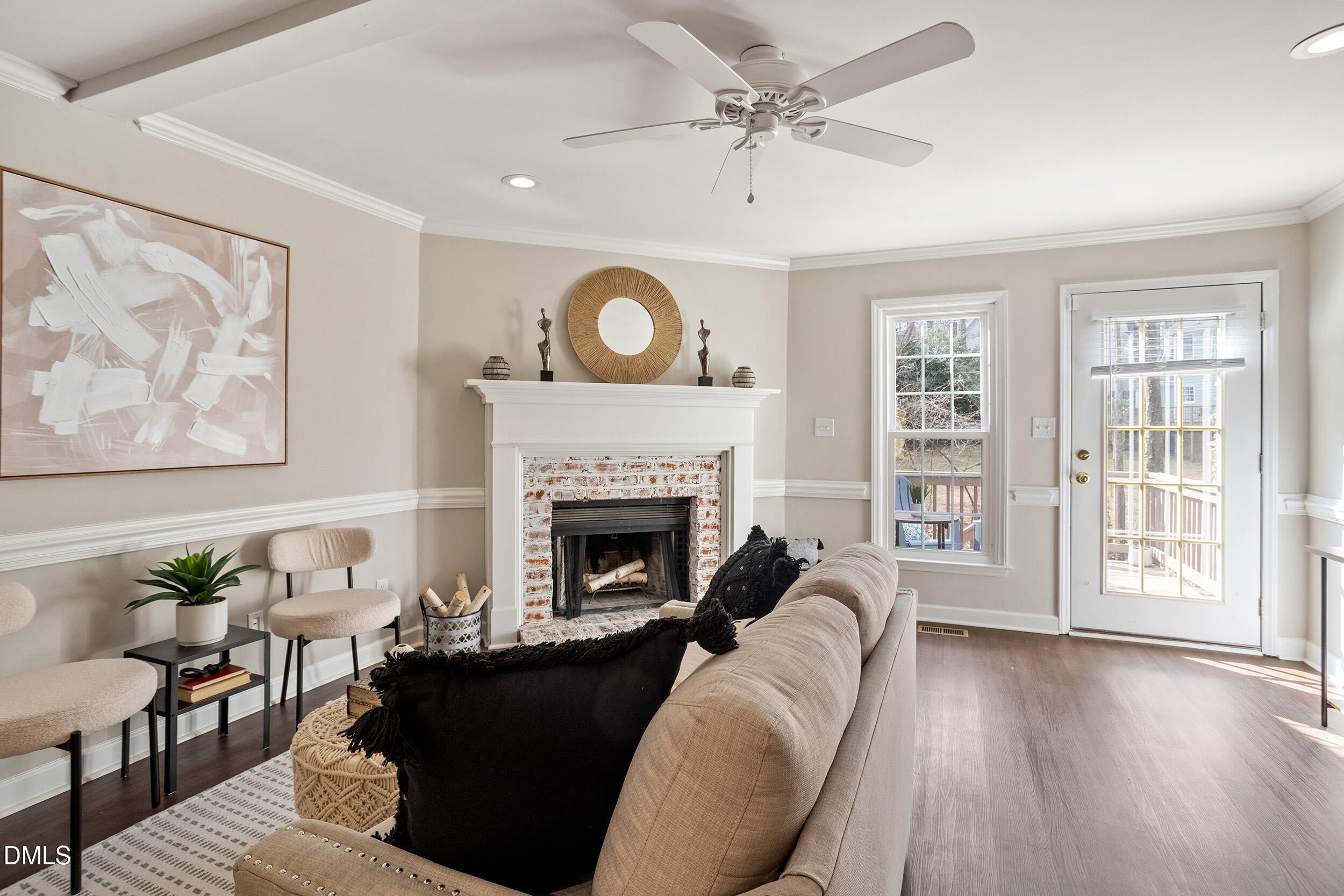 4619 Hershey Court Raleigh, NC 27613 - Photo 15 of 43 a living room with furniture and a fireplace