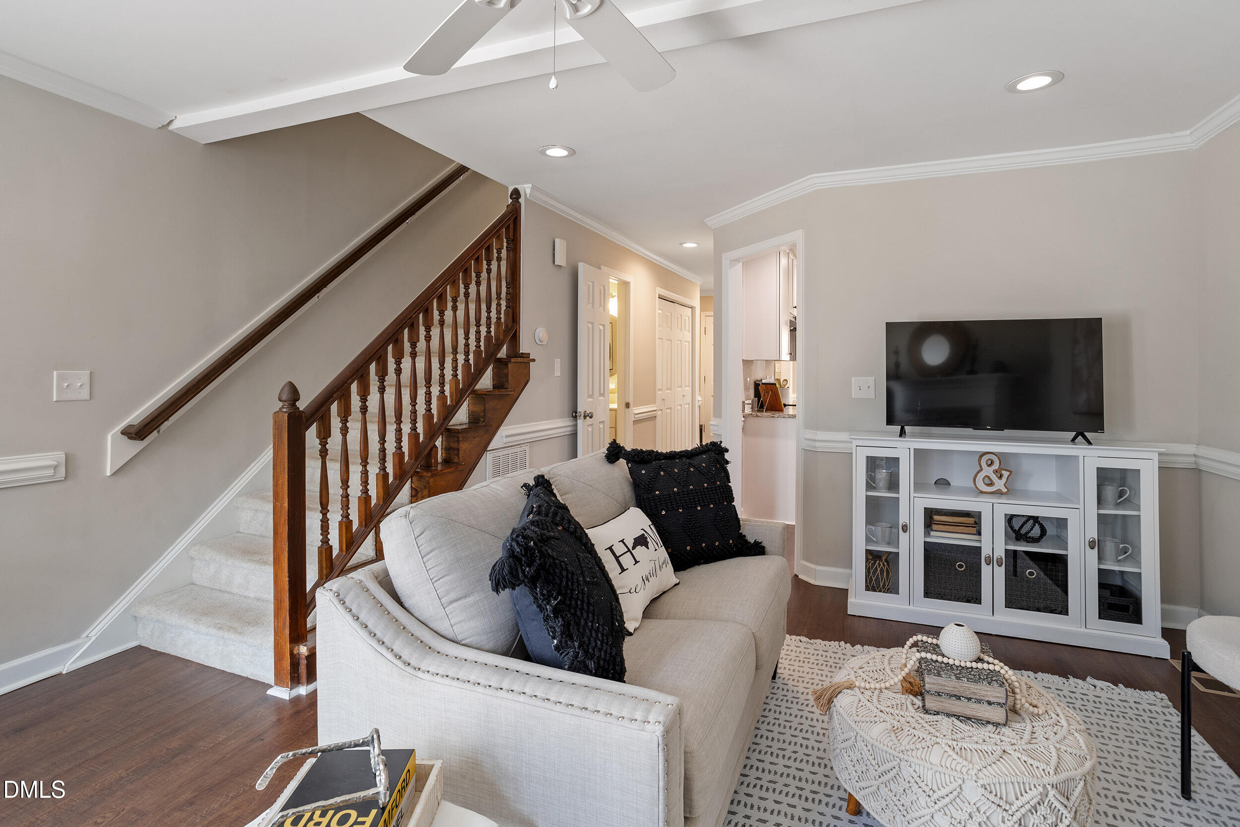 4619 Hershey Court Raleigh, NC 27613 - Photo 17 of 43 a living room with furniture and a flat screen tv