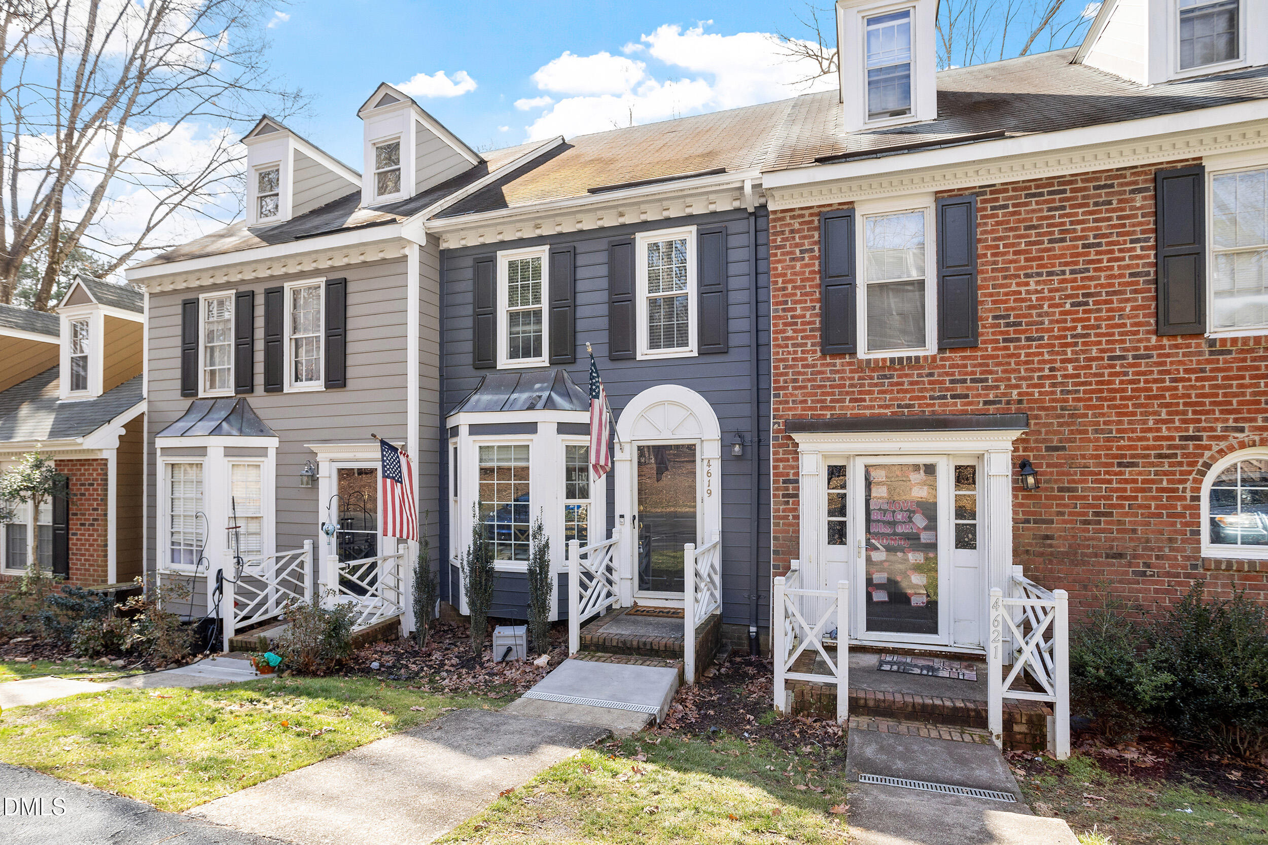 4619 Hershey Court Raleigh, NC 27613 - Photo 2 of 43 a front view of a house with yard and large tree