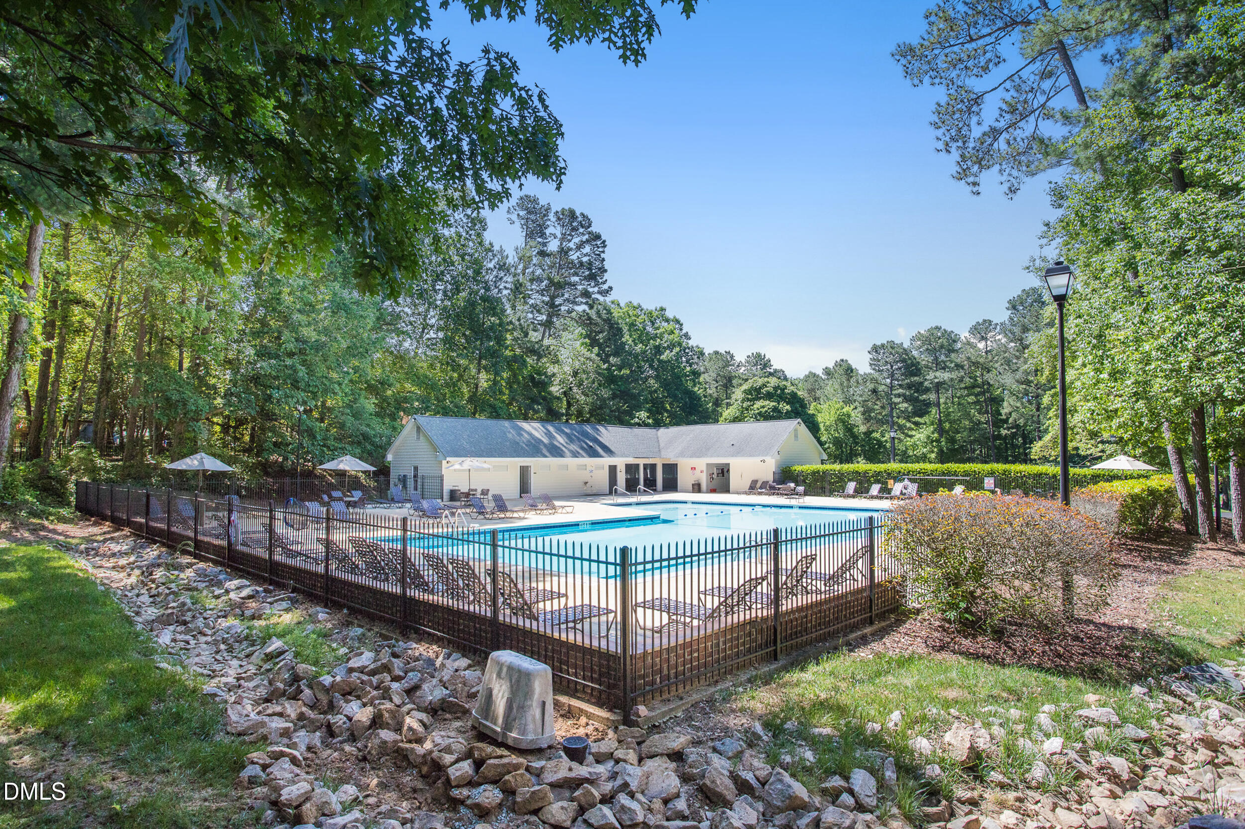 4619 Hershey Court Raleigh, NC 27613 - Photo 36 of 43 a view of a backyard with sitting area