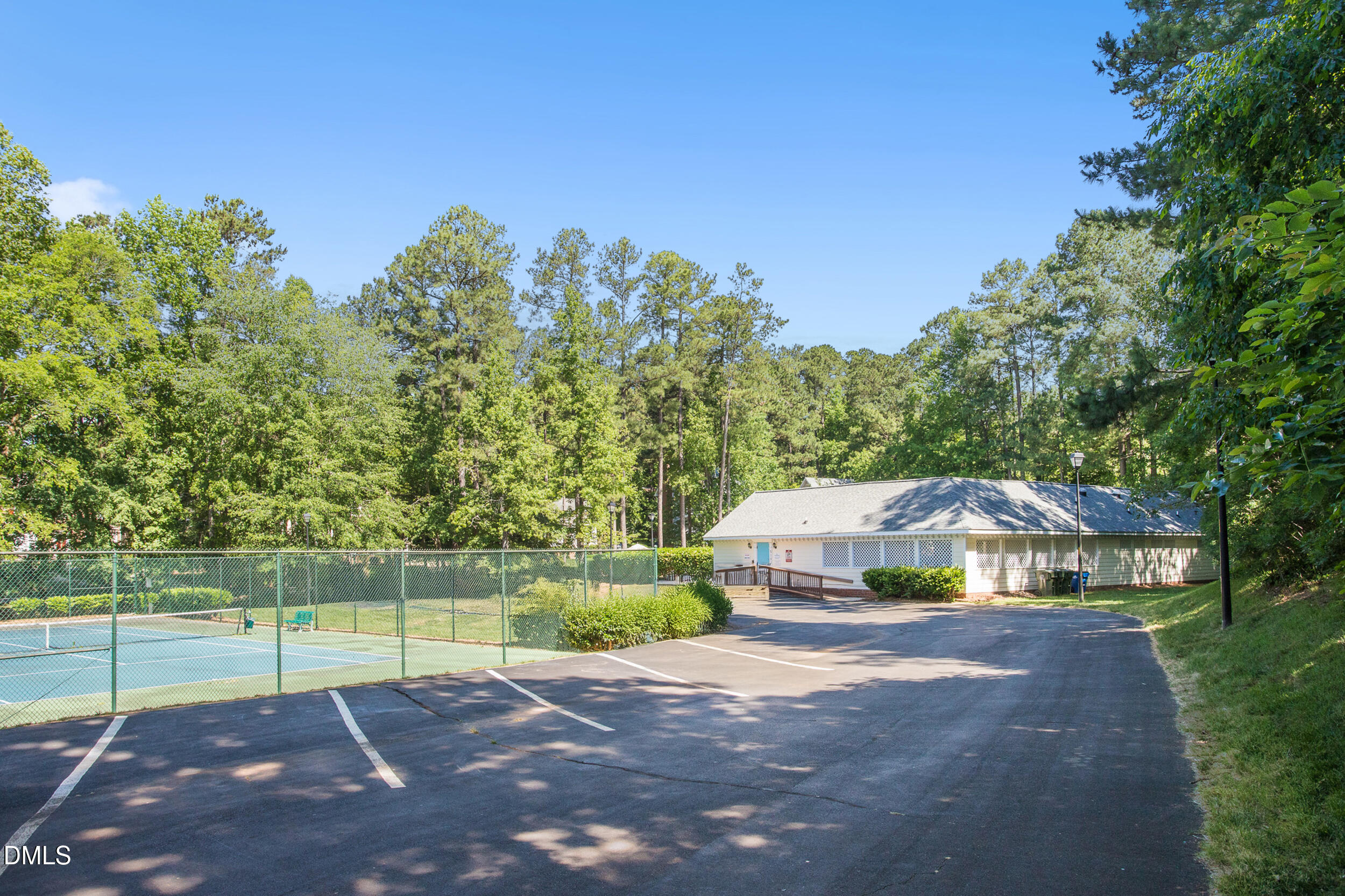4619 Hershey Court Raleigh, NC 27613 - Photo 38 of 43 a view of a house with a yard and a large tree