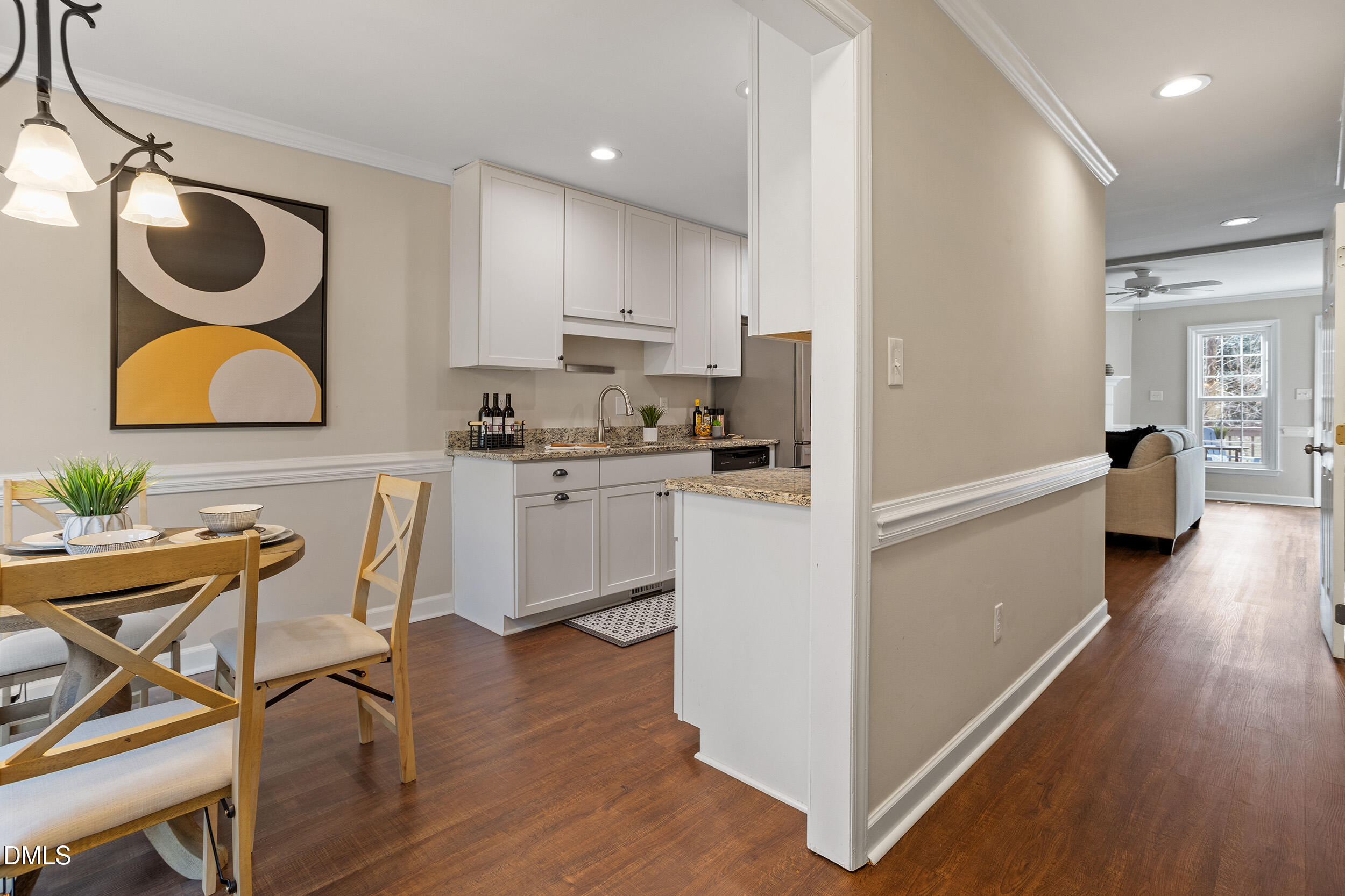 4619 Hershey Court Raleigh, NC 27613 - Photo 5 of 43 a view of kitchen with cabinets and wooden floor