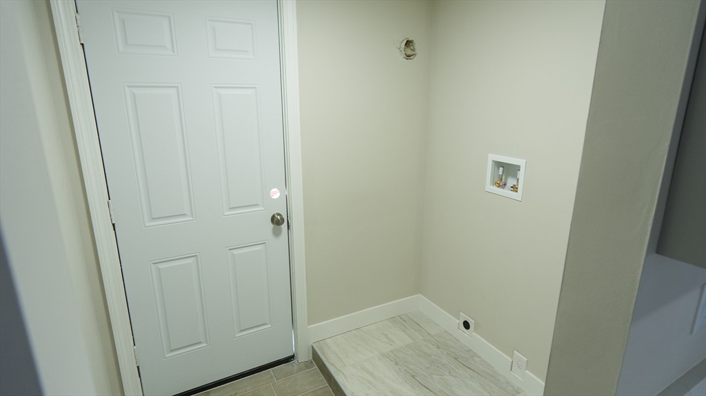 26 Maple Street Spencer, MA 01562 - Photo 20 of 27 a bathroom with a sink