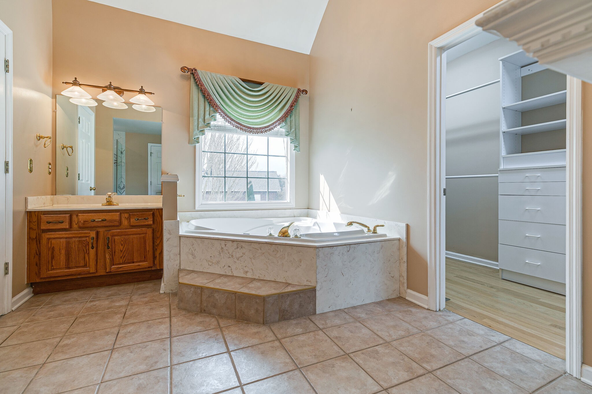 Undisclosed Address Franklin, TN 37064 - Photo 21 of 67 a spacious bathroom with a sink a mirror and a bathtub