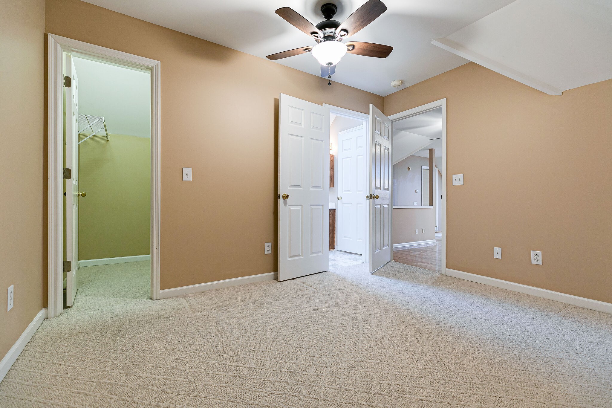 Undisclosed Address Franklin, TN 37064 - Photo 32 of 67 an empty room with fan and entrance