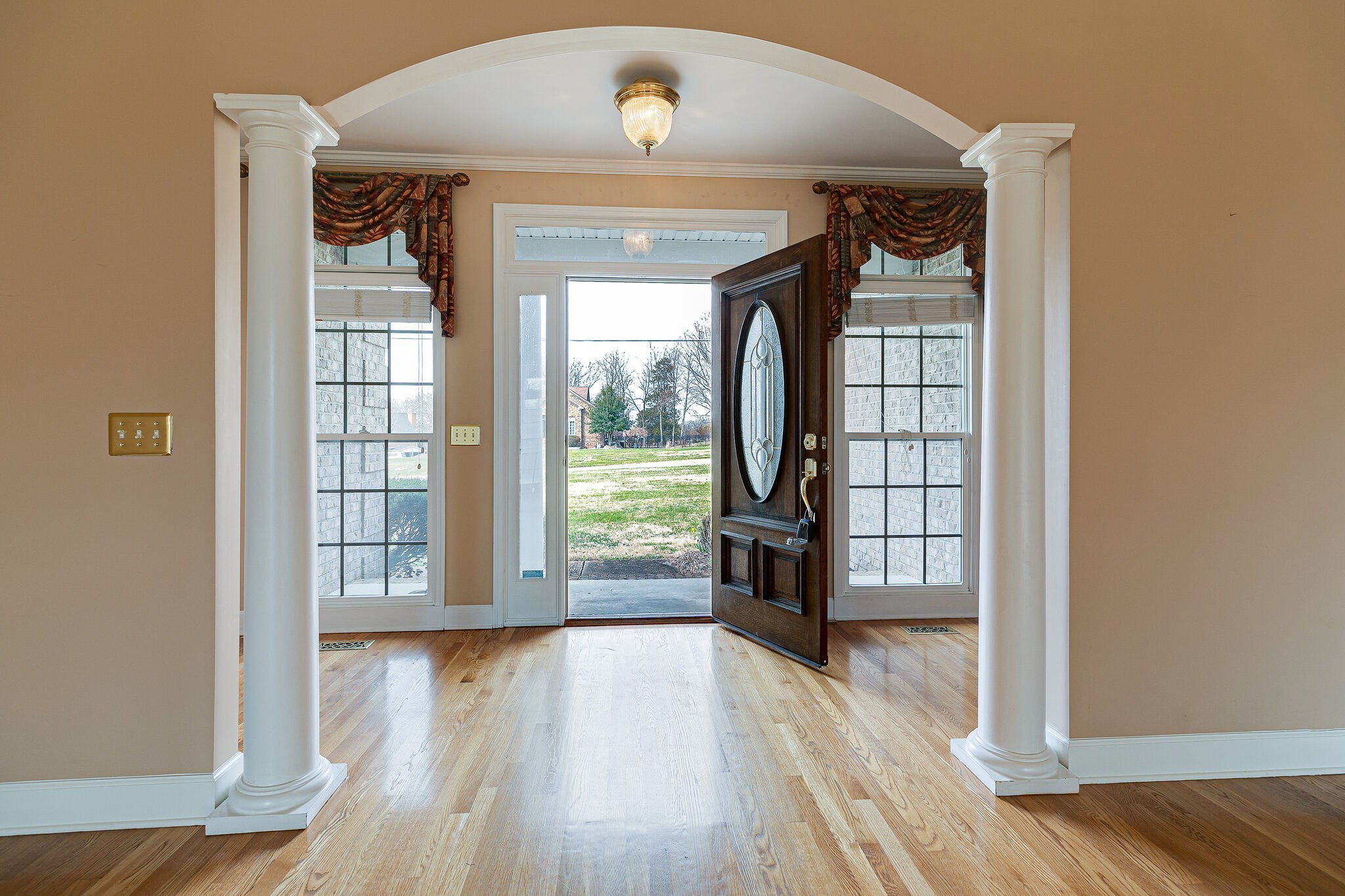 Undisclosed Address Franklin, TN 37064 - Photo 5 of 67 a view of livingroom with furniture and wooden floor