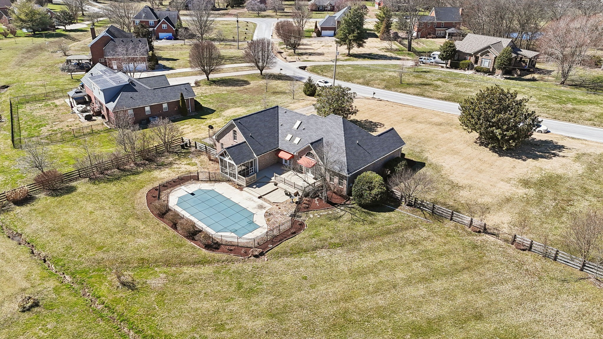 Undisclosed Address Franklin, TN 37064 - Photo 57 of 67 an aerial view of a house with a yard and lake view