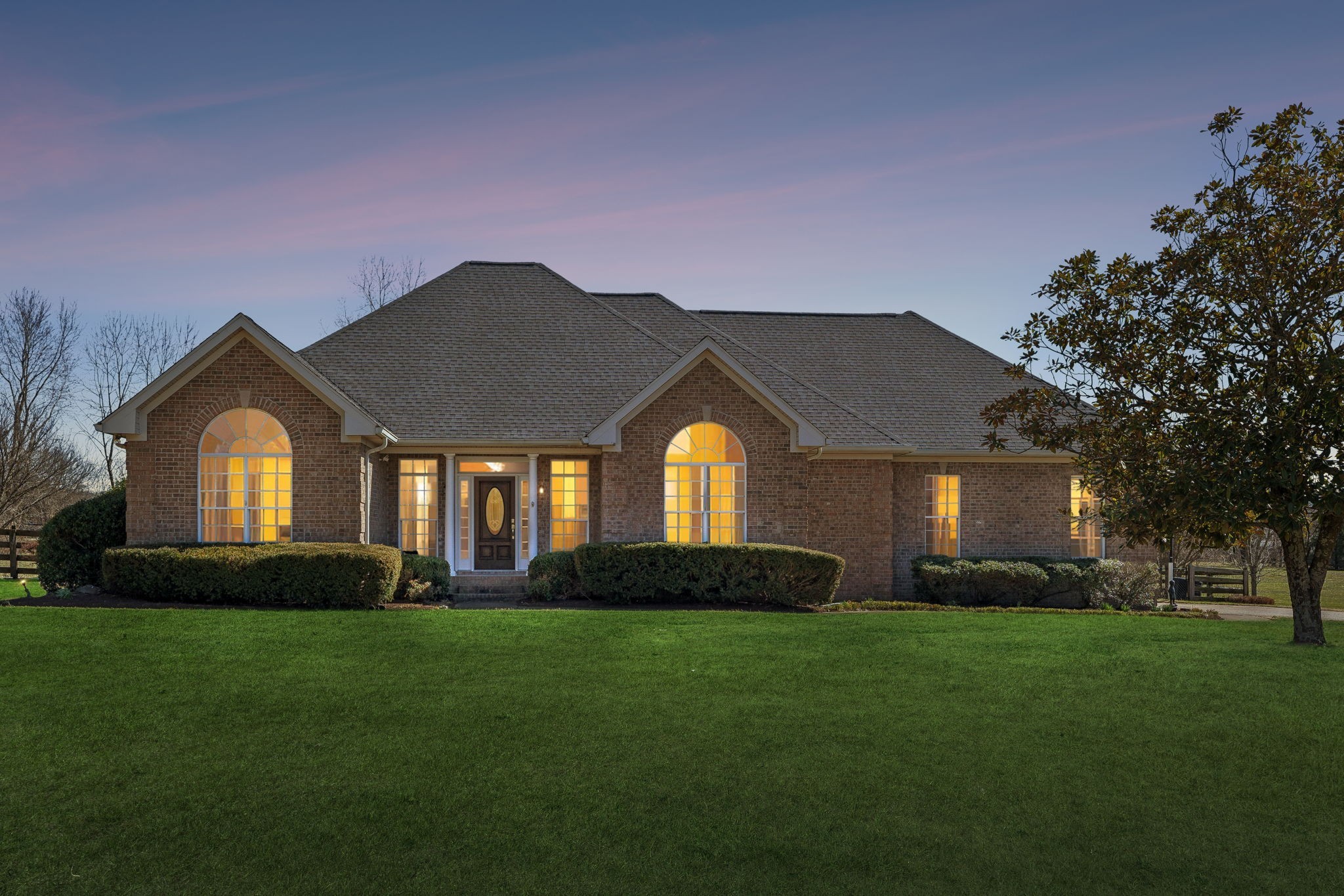 Undisclosed Address Franklin, TN 37064 - Photo 67 of 67 a front view of a house with a garden