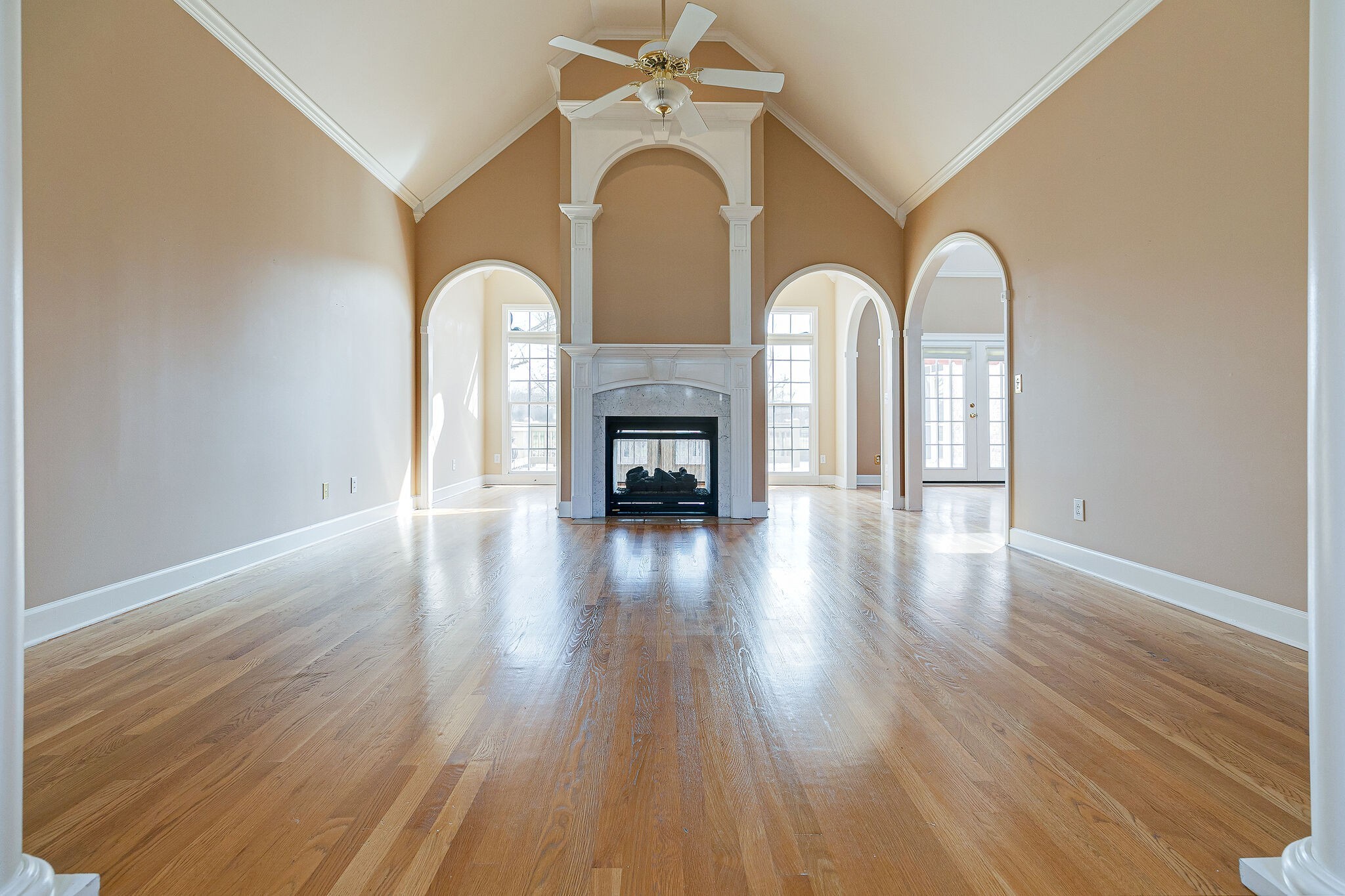 Undisclosed Address Franklin, TN 37064 - Photo 9 of 67 a view of a livingroom with fireplace wooden floor and windows