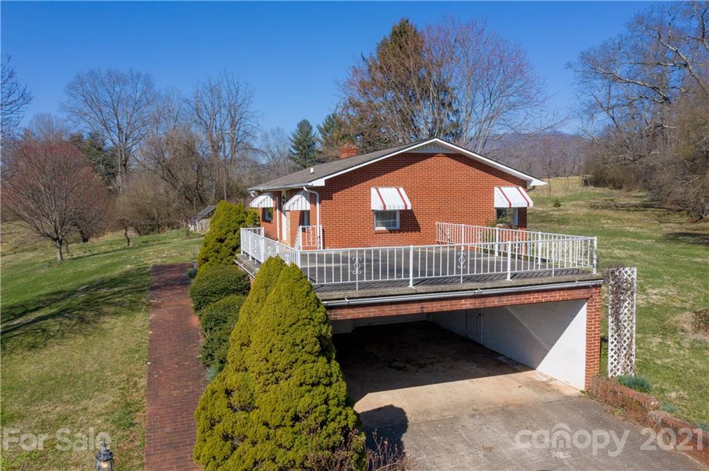 85 Walnut Ford Road Clyde, NC 28721 - Photo 3 of 24 a view of a garden