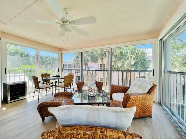 a bedroom with bed and night stand