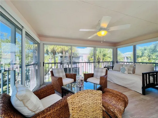 a kitchen with a refrigerator and a stove