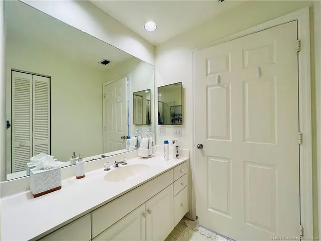 a view of a city with an ocean