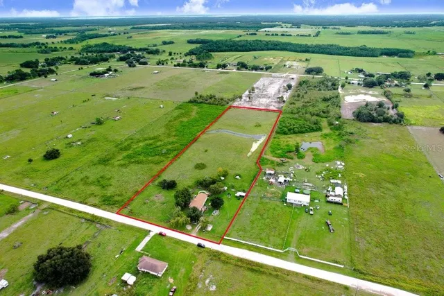 a view of a garden with an outdoor space