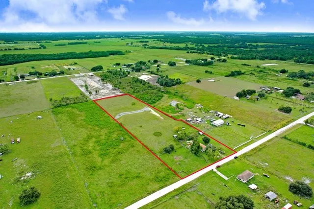 a view of a golf course with a yard