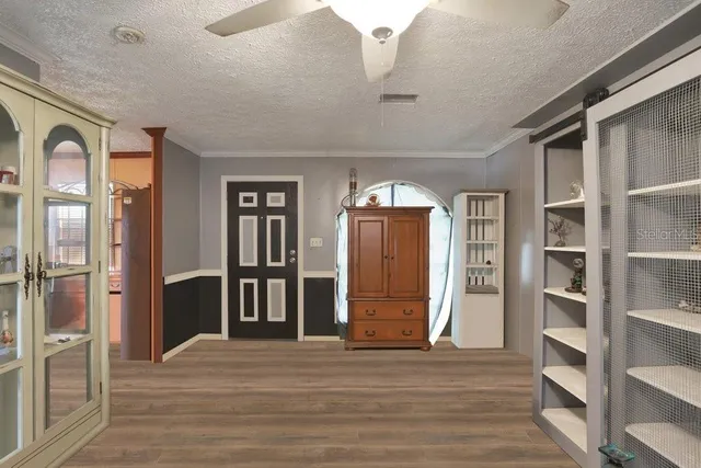 a view of empty room with closet