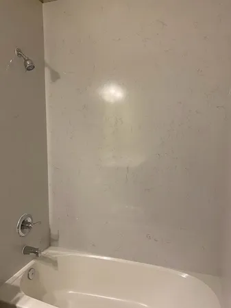 a bathroom with a bathtub