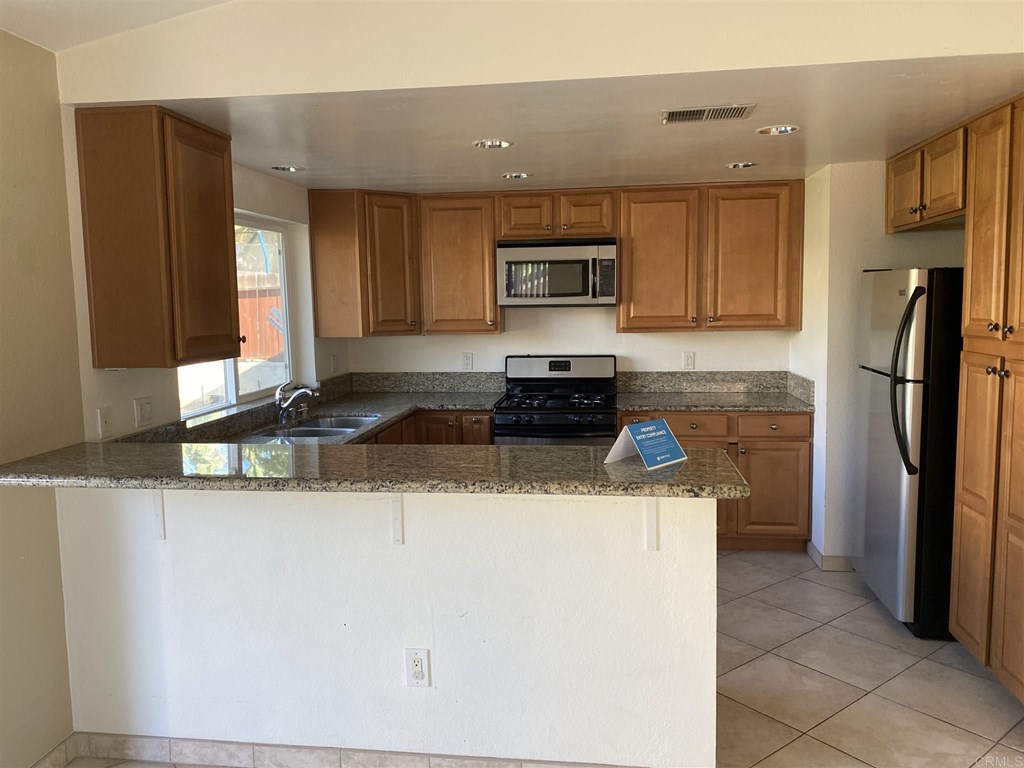 1565 Spring Creek Lane Oceanside, CA 92057 - Photo 4 of 4