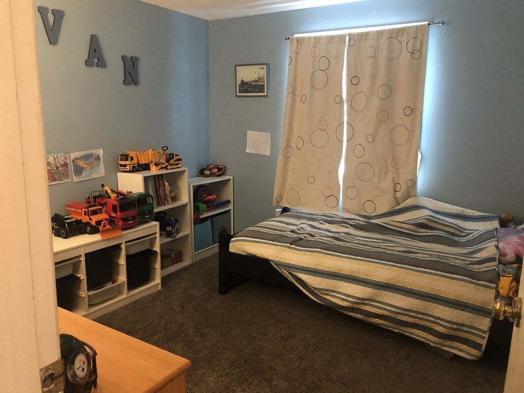 74 Old Stage Road Chelmsford, MA 01824 - Photo 11 of 33 a bedroom with bed and a window