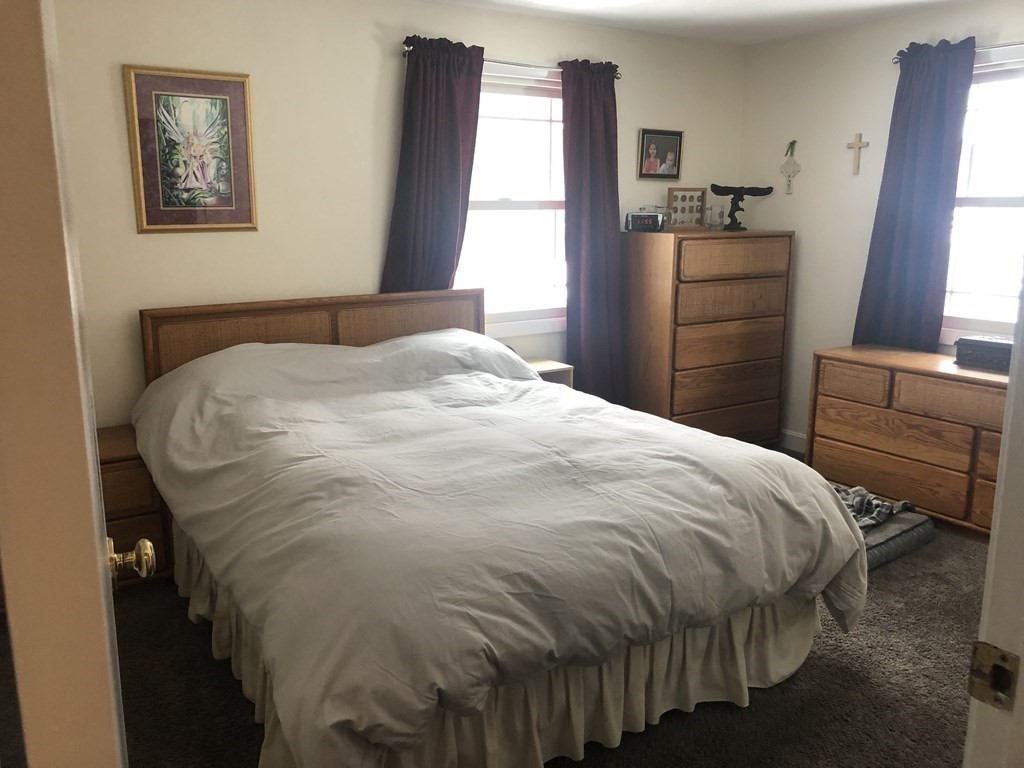 74 Old Stage Road Chelmsford, MA 01824 - Photo 13 of 33 a bedroom with a bed and a window