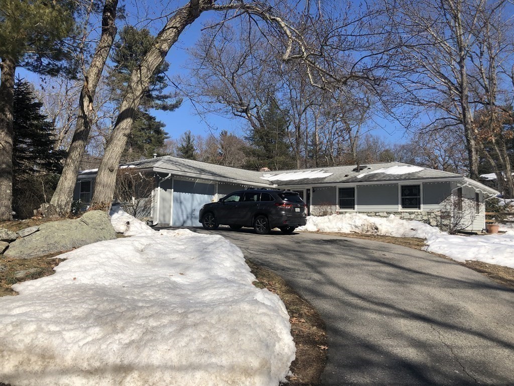 74 Old Stage Road Chelmsford, MA 01824 - Photo 25 of 33 a front view of a house with a yard
