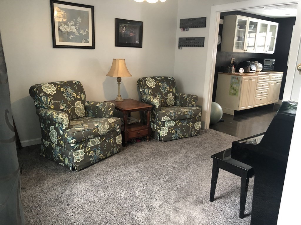74 Old Stage Road Chelmsford, MA 01824 - Photo 6 of 33 a living room with furniture and a window