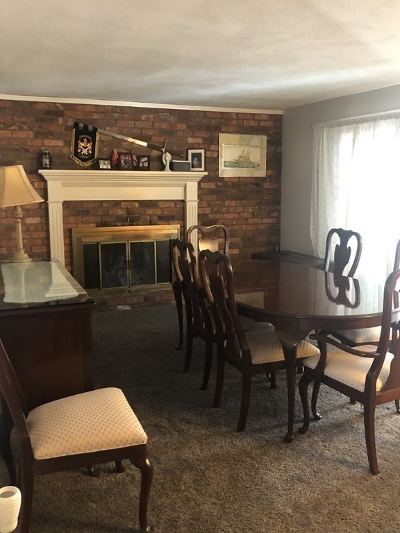 74 Old Stage Road Chelmsford, MA 01824 - Photo 10 of 33 a view of a dining room with furniture