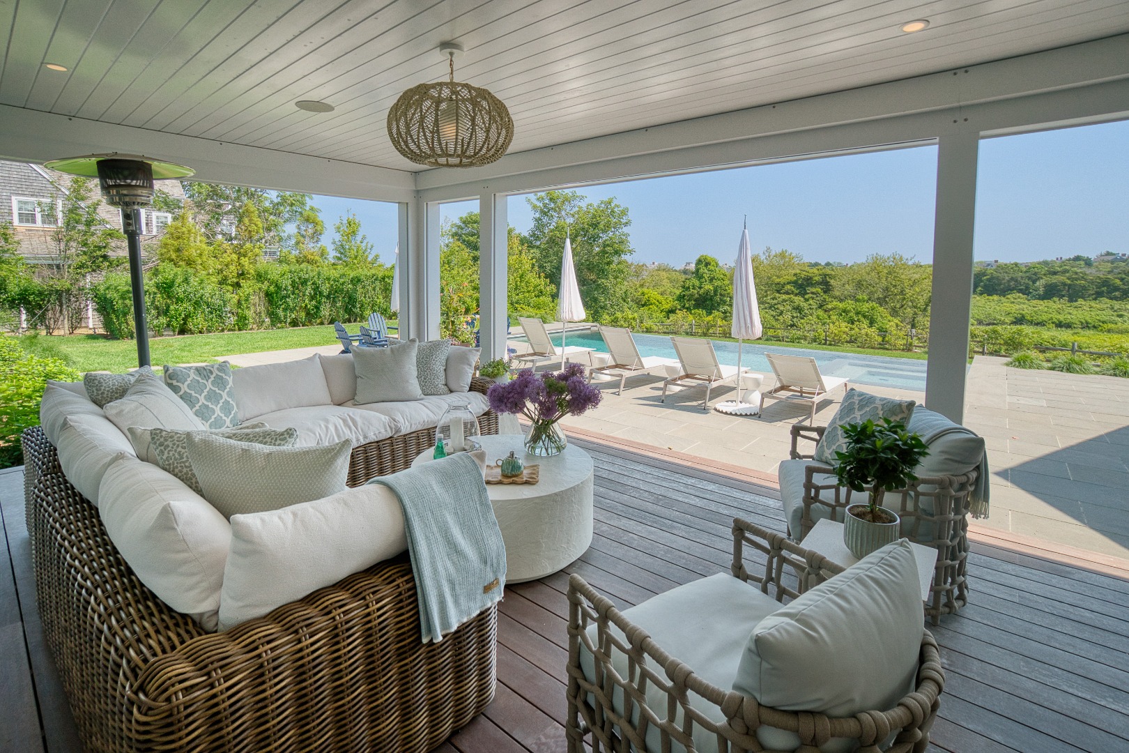 41 Monomoy Road Nantucket, MA 02554 - Photo 14 of 54 a living room with furniture and a large window