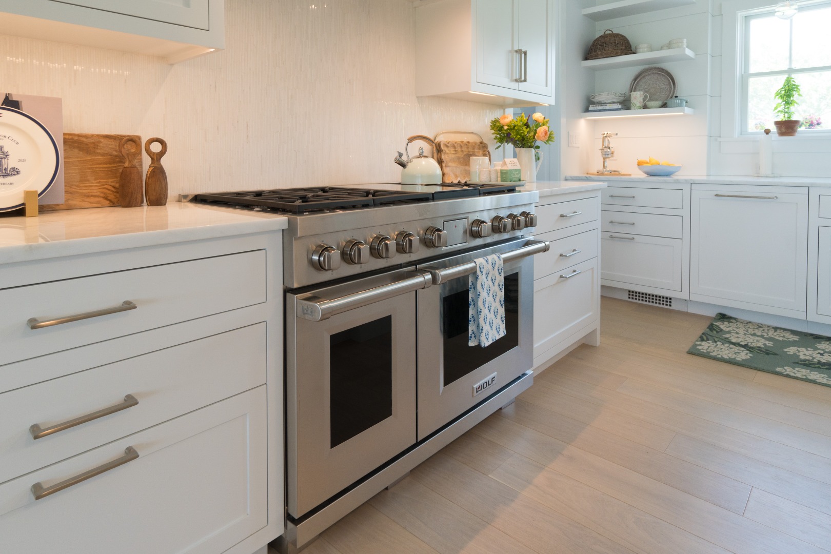 41 Monomoy Road Nantucket, MA 02554 - Photo 25 of 54 a white stove top oven sitting inside of a kitchen