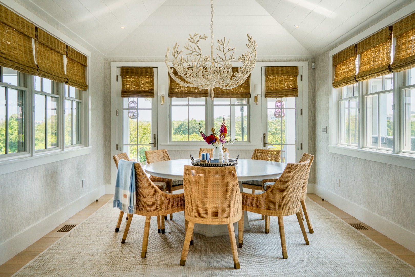 41 Monomoy Road Nantucket, MA 02554 - Photo 27 of 54 a view of a dining room with furniture large windows and wooden floor