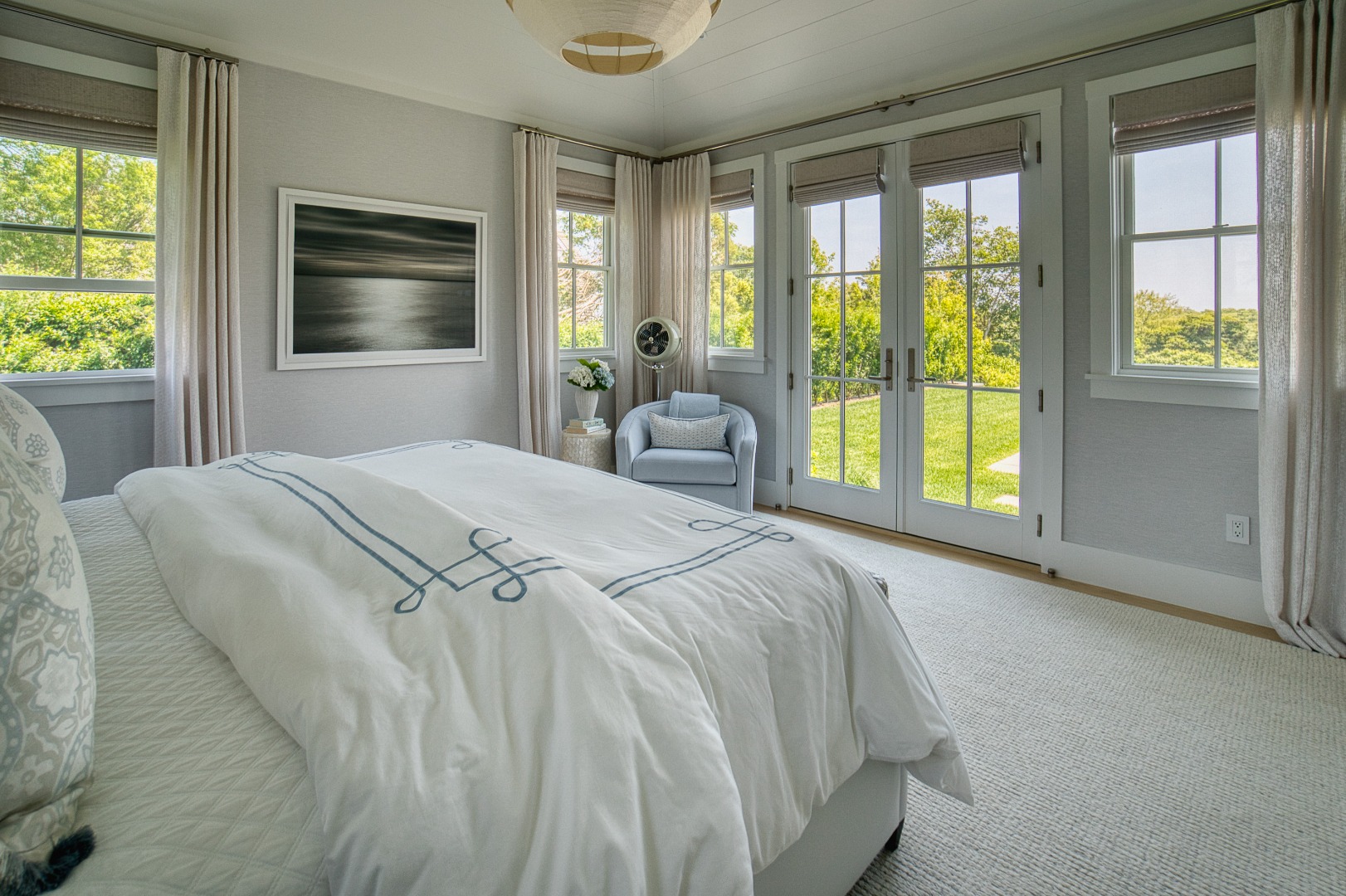 41 Monomoy Road Nantucket, MA 02554 - Photo 34 of 54 a bedroom with a bed and a large window