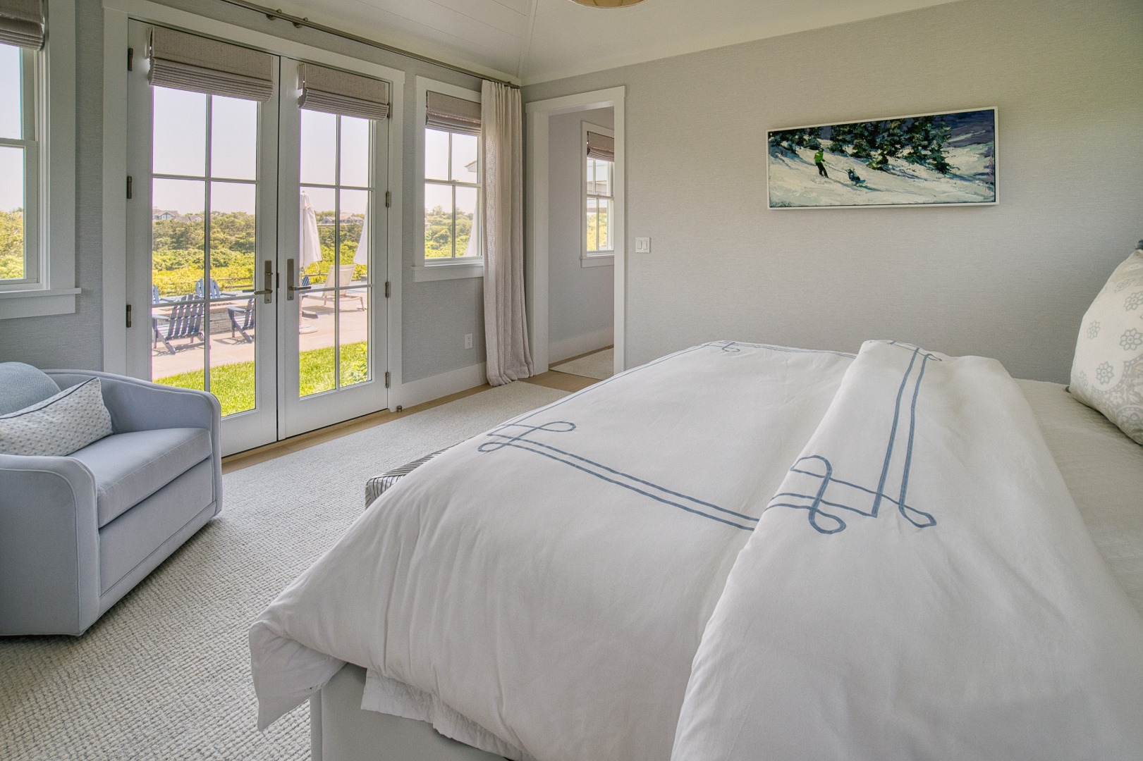 41 Monomoy Road Nantucket, MA 02554 - Photo 35 of 54 a bedroom with a bed couch and a large window