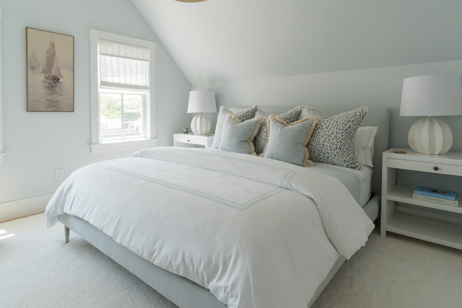 41 Monomoy Road Nantucket, MA 02554 - Photo 53 of 54 a large bed sitting in a bedroom next to a window