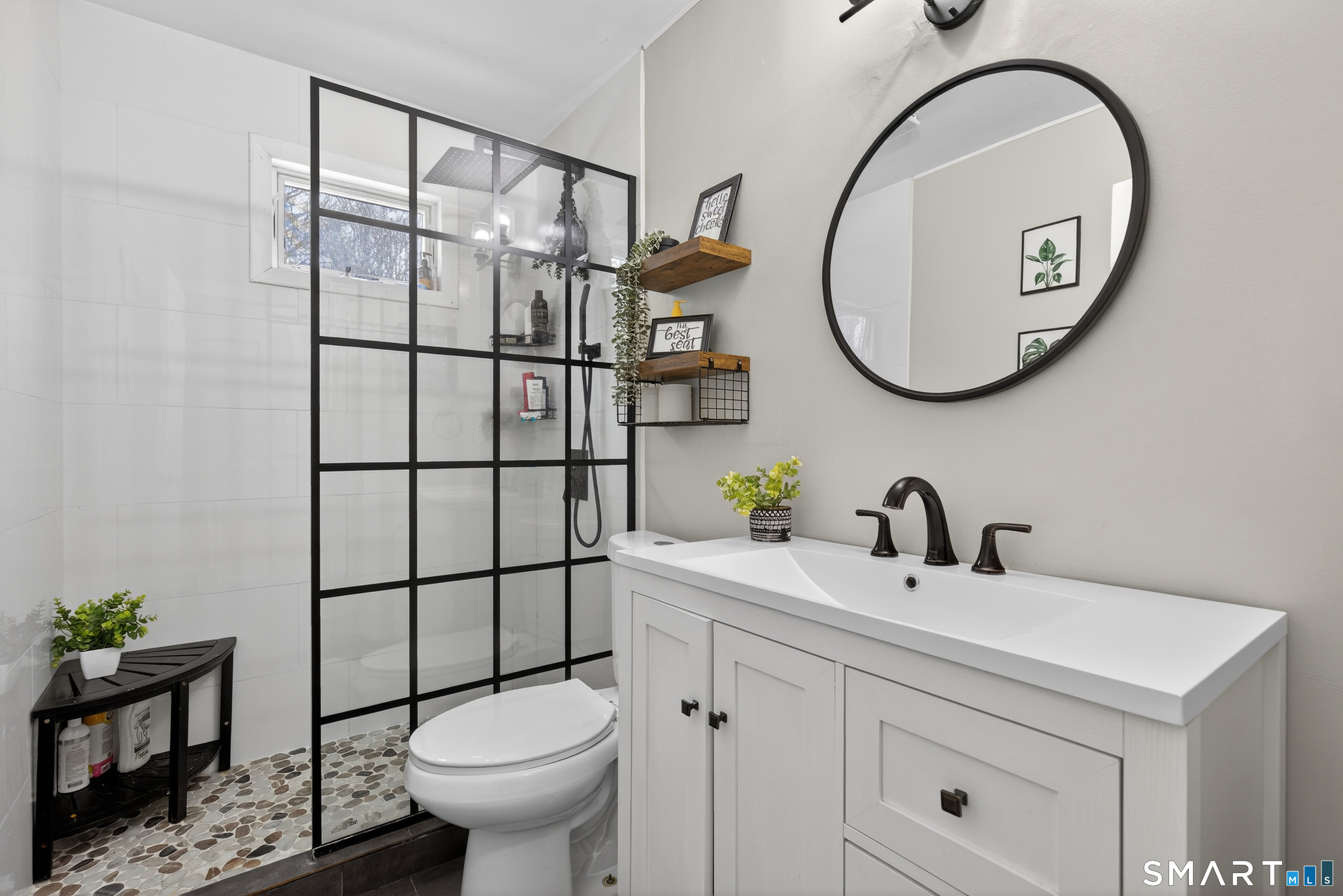 15 Evelyn Road Derby, CT 06418 - Photo 12 of 34 a bathroom with a toilet sink and mirror