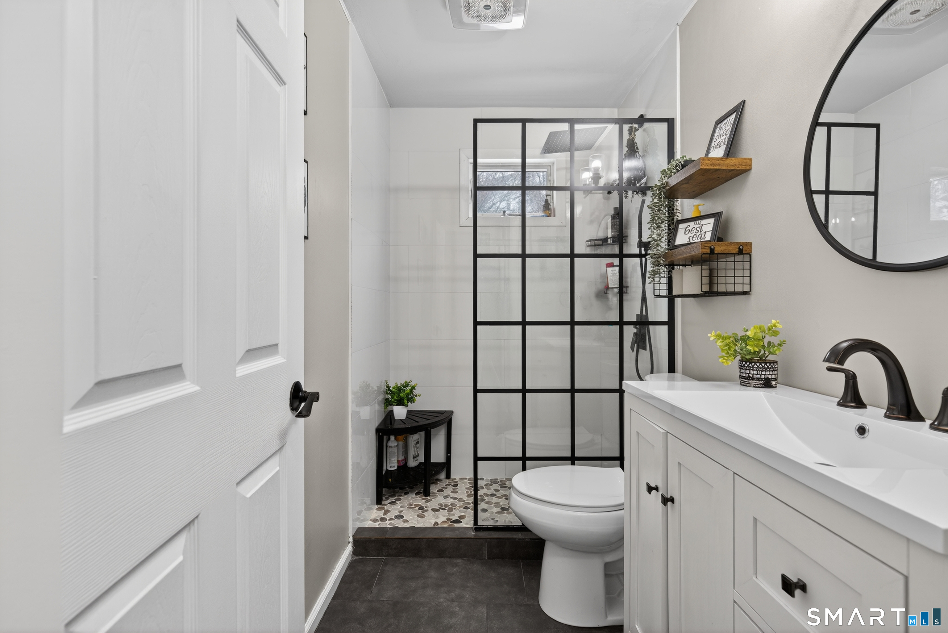 15 Evelyn Road Derby, CT 06418 - Photo 13 of 34 a bathroom with a toilet a sink and a mirror
