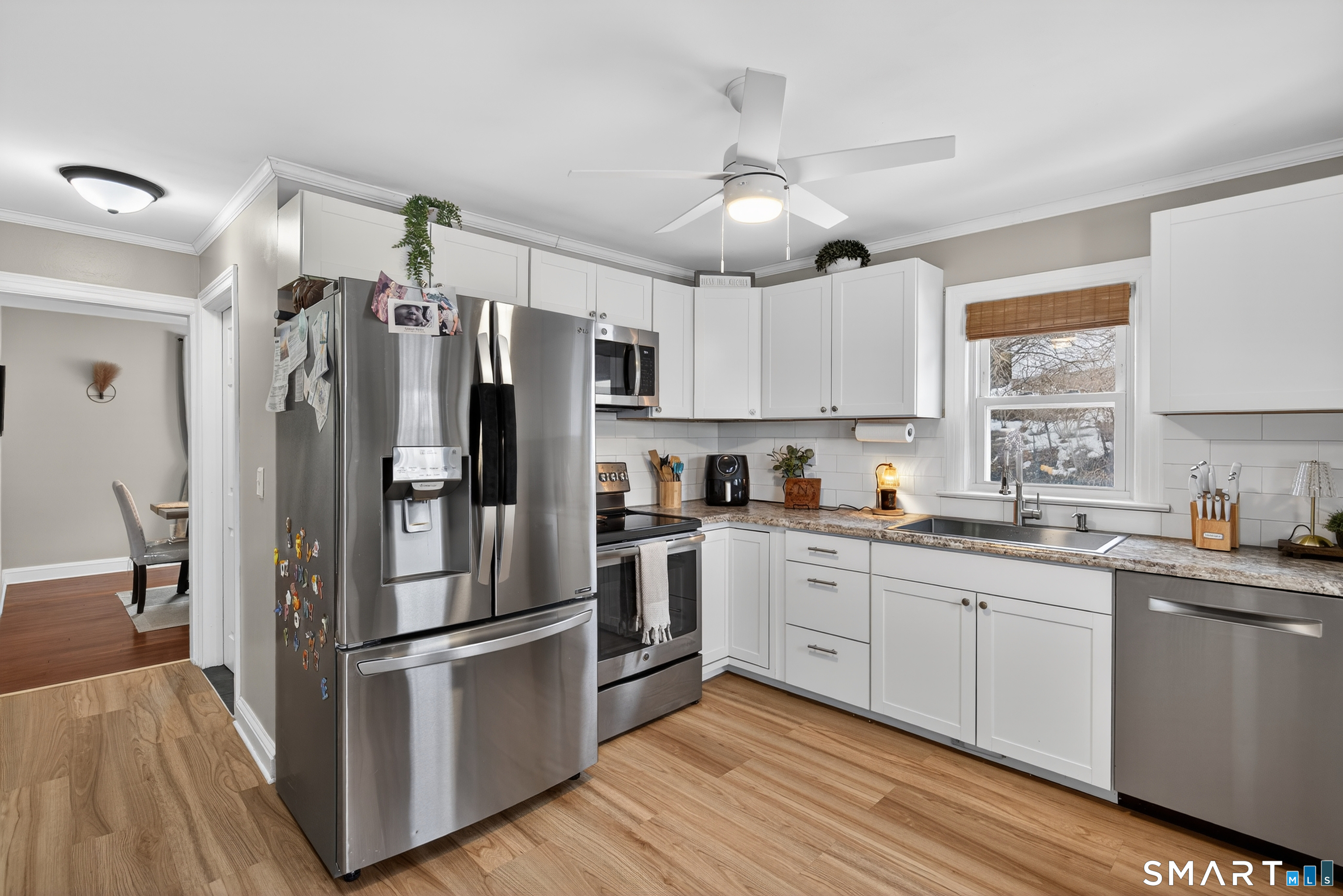 15 Evelyn Road Derby, CT 06418 - Photo 14 of 34 a kitchen with stainless steel appliances a refrigerator sink and microwave