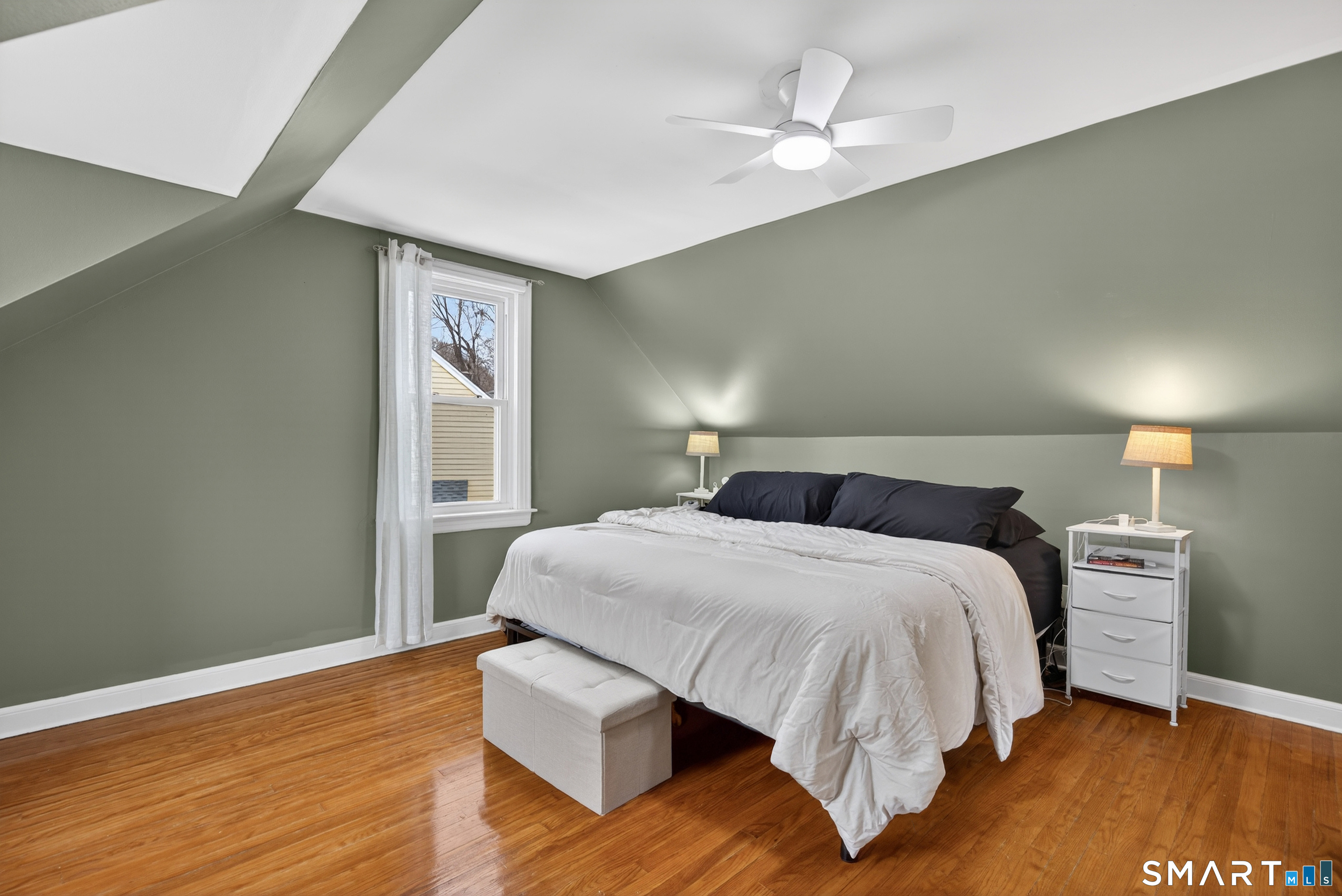 15 Evelyn Road Derby, CT 06418 - Photo 20 of 34 a bedroom with a bed and wooden floor