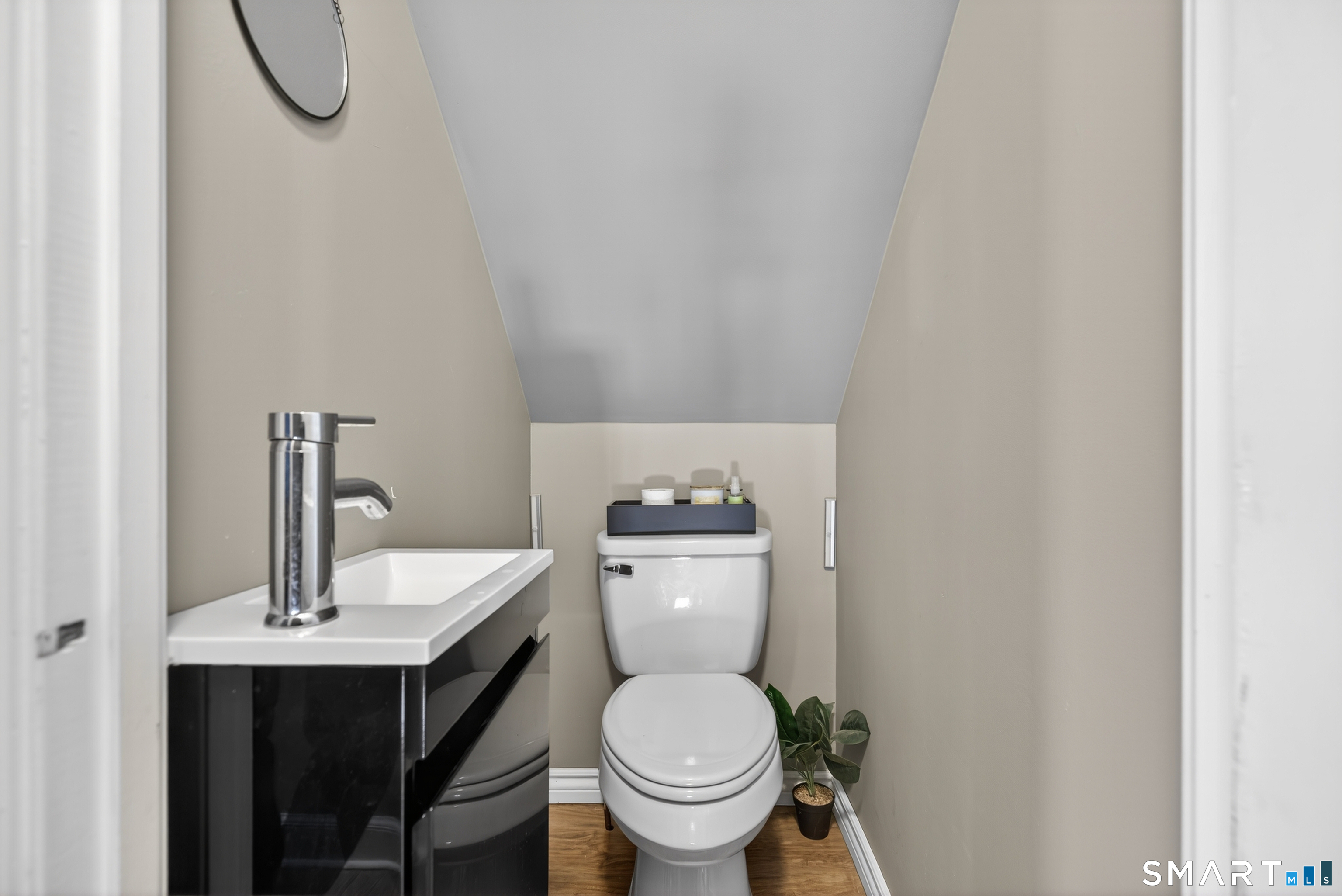 15 Evelyn Road Derby, CT 06418 - Photo 24 of 34 a bathroom with a sink toilet and a mirror