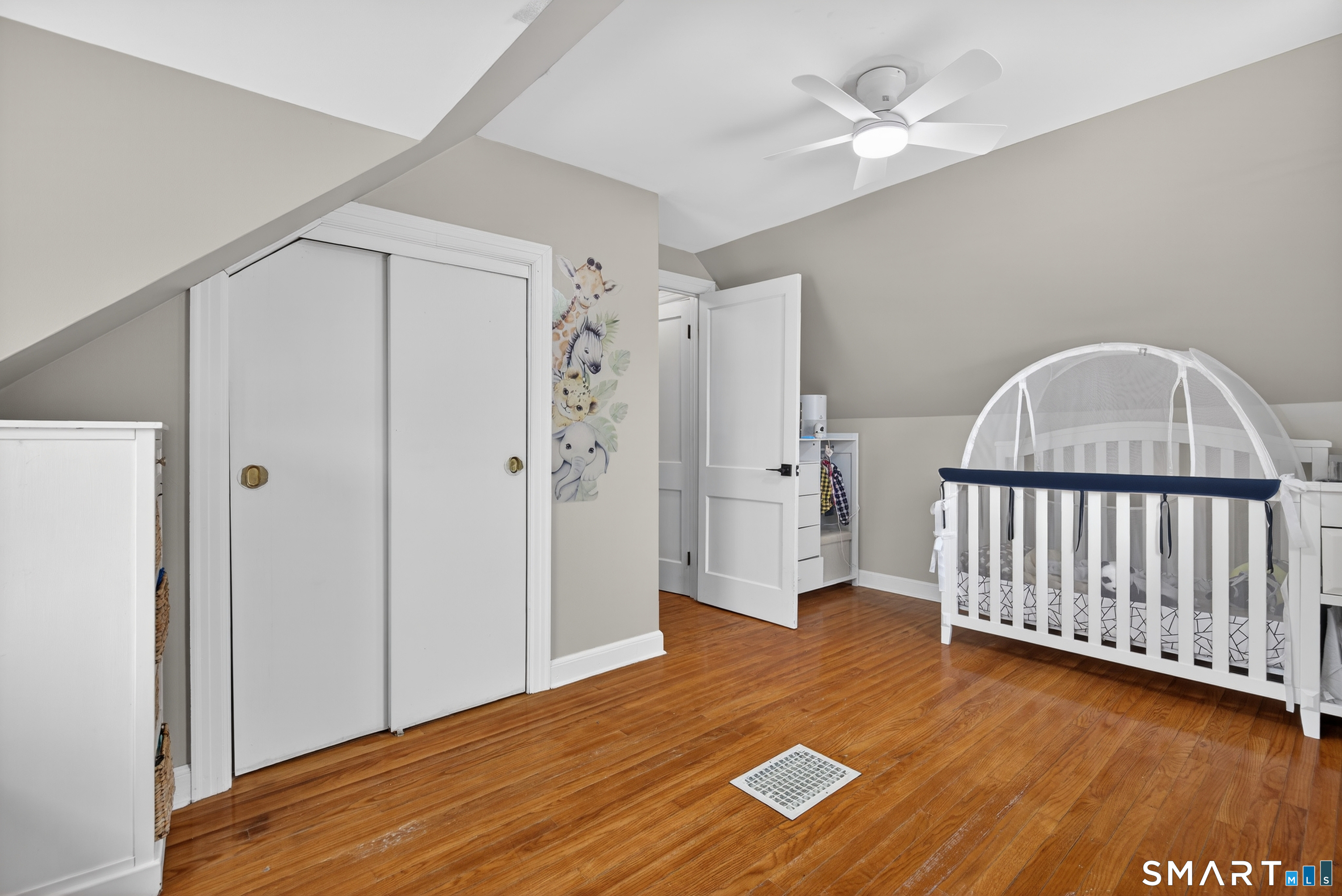 15 Evelyn Road Derby, CT 06418 - Photo 27 of 34 a view of livingroom with hardwood floor and ceiling fan