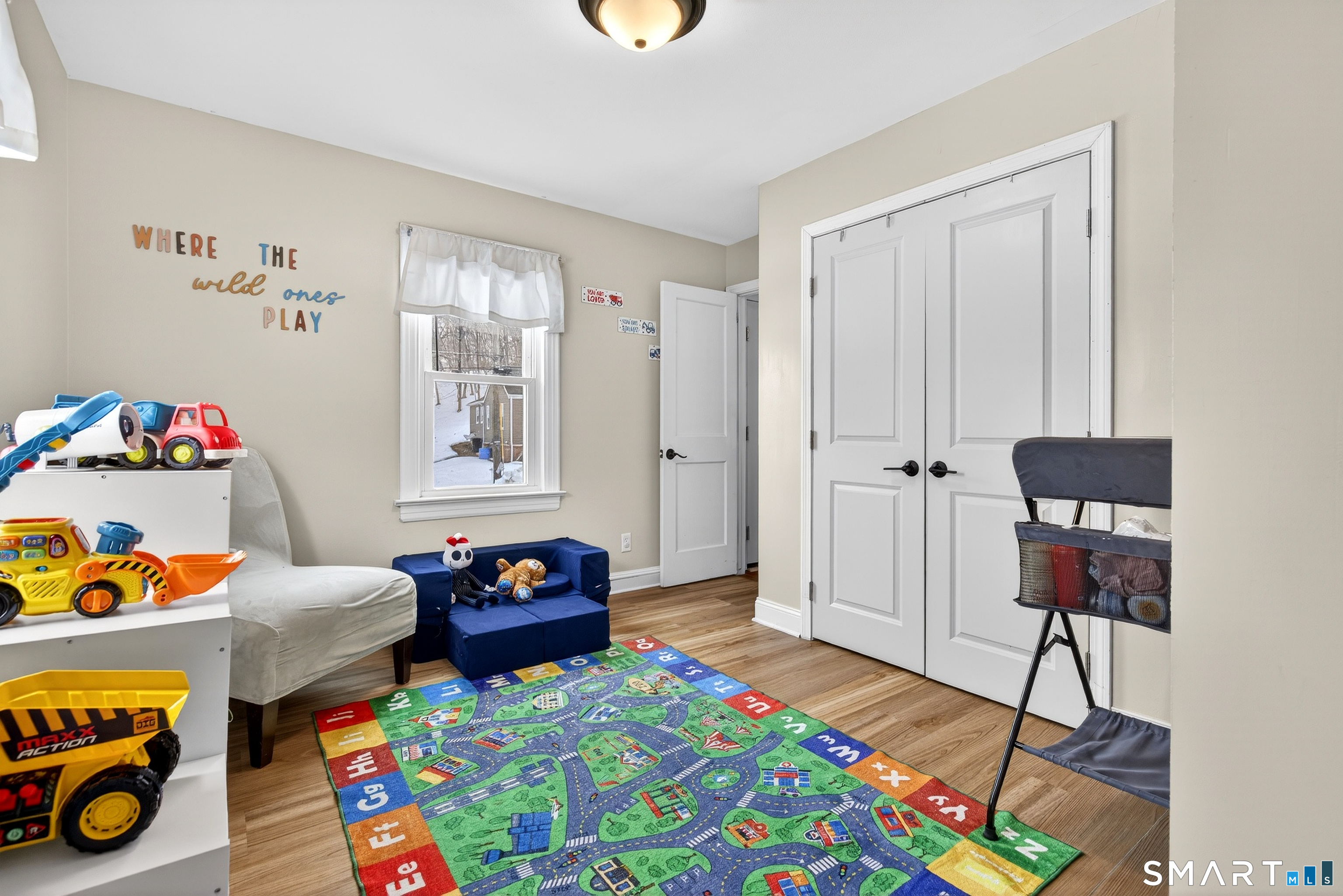 15 Evelyn Road Derby, CT 06418 - Photo 29 of 34 a bedroom with a bed and wooden floor