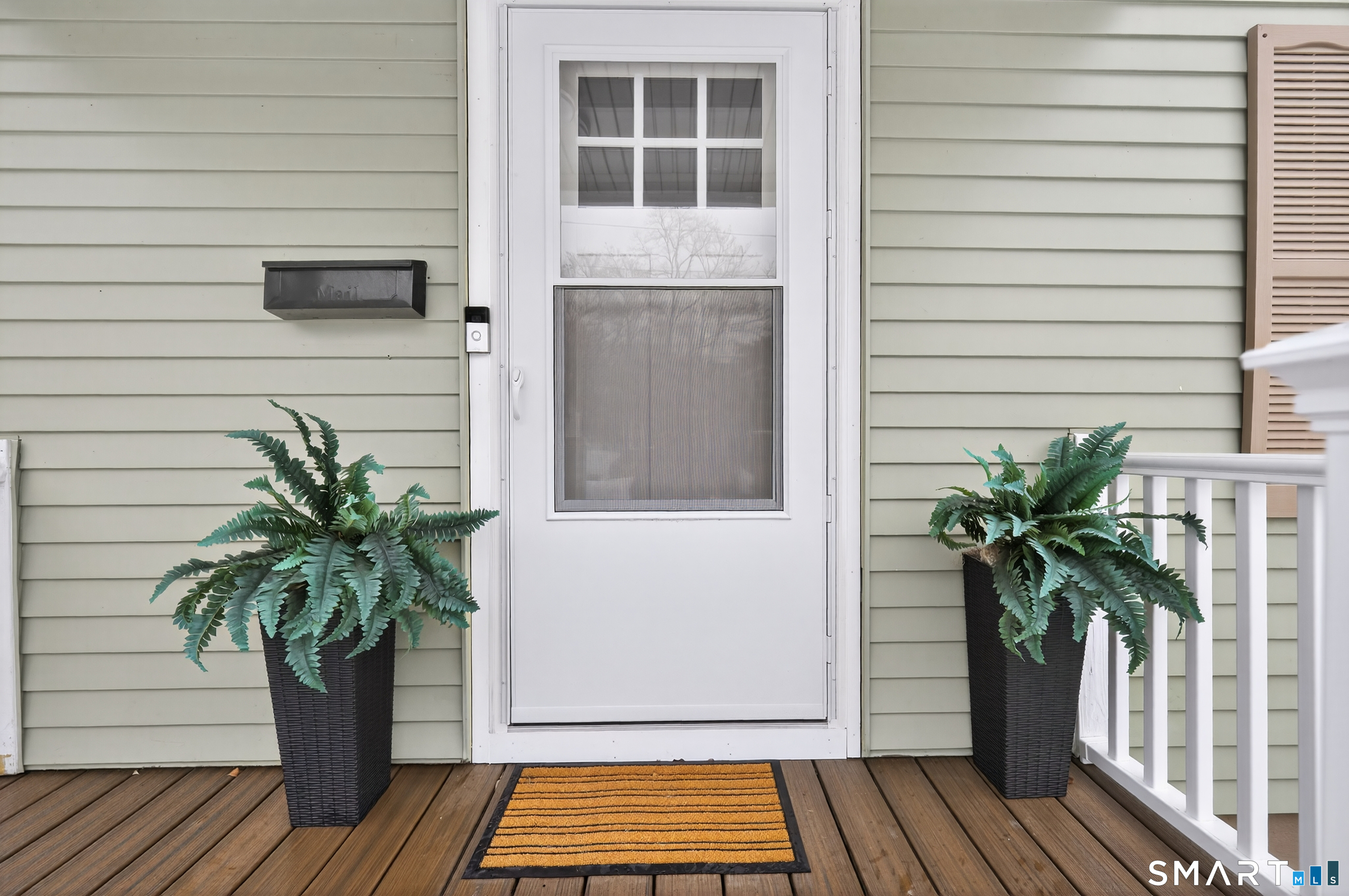 15 Evelyn Road Derby, CT 06418 - Photo 3 of 34 a potted plant in front of a house