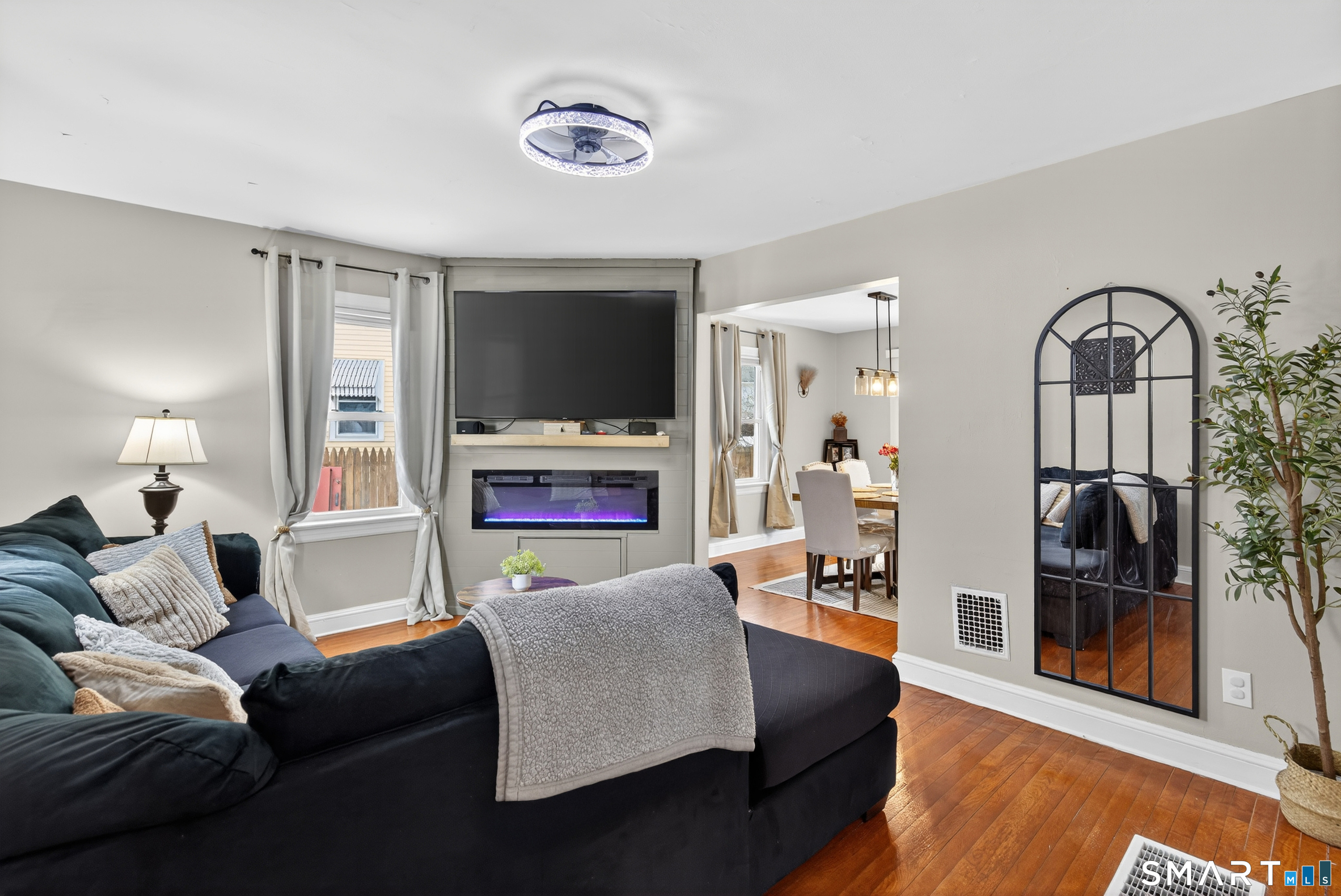 15 Evelyn Road Derby, CT 06418 - Photo 5 of 34 a living room with furniture and a flat screen tv