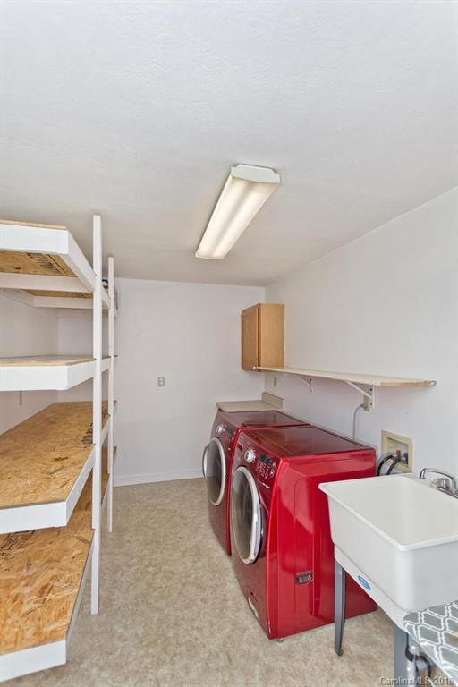 282 Fox Creek Road Mars Hill, NC 28754 - Photo 13 of 36 a utility room with dryer and washer