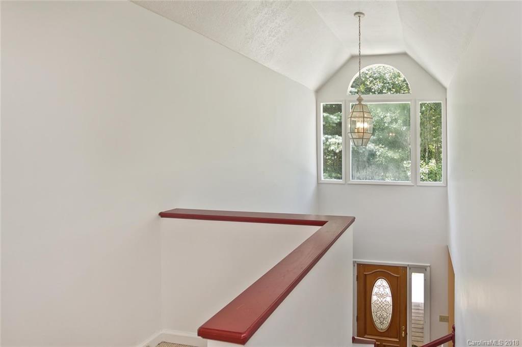 282 Fox Creek Road Mars Hill, NC 28754 - Photo 14 of 36 a view of room with window and wooden floor