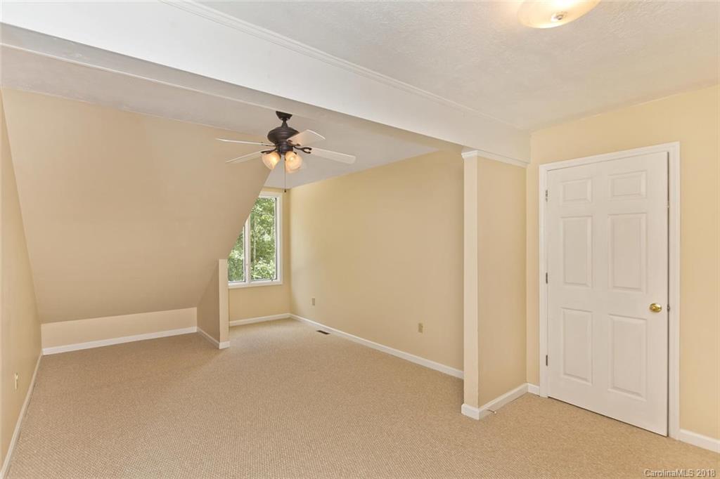282 Fox Creek Road Mars Hill, NC 28754 - Photo 15 of 36 a view of an empty room with a window