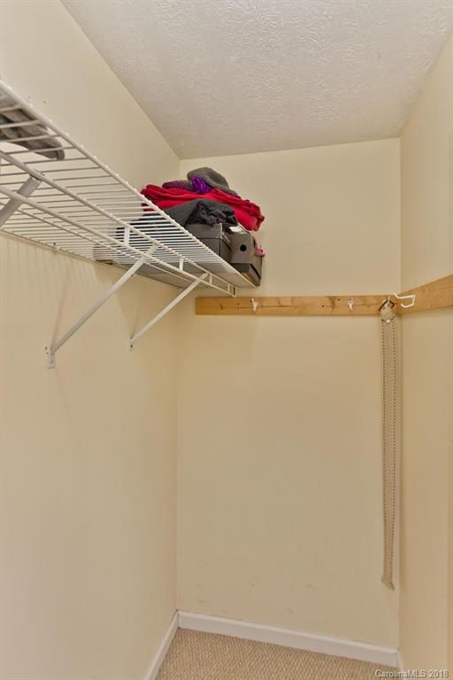 282 Fox Creek Road Mars Hill, NC 28754 - Photo 17 of 36 a utility room with a shower and a ceiling fan