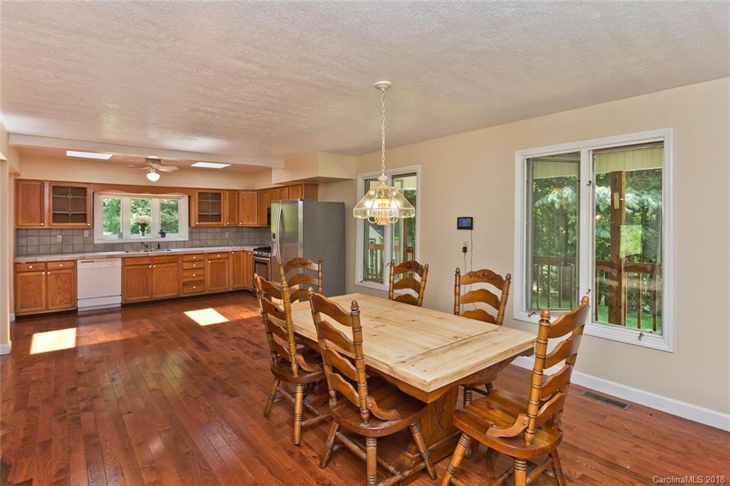 282 Fox Creek Road Mars Hill, NC 28754 - Photo 3 of 36 a dining room with furniture and window