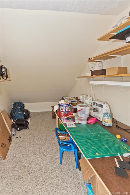 282 Fox Creek Road Mars Hill, NC 28754 - Photo 26 of 36 a room with furniture and toys