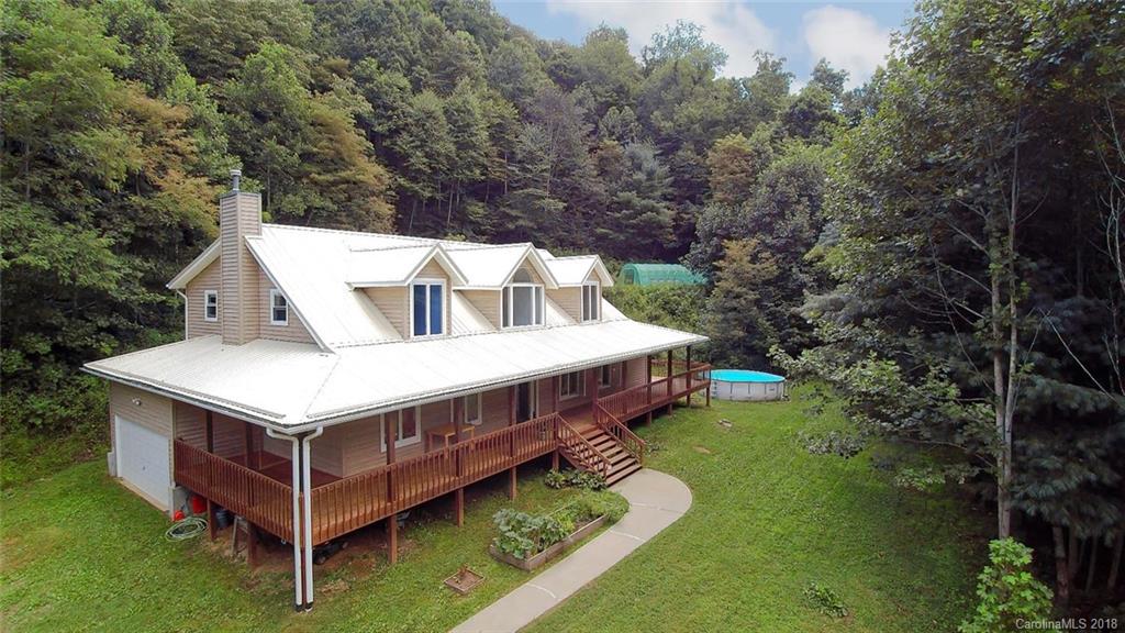 282 Fox Creek Road Mars Hill, NC 28754 - Photo 29 of 36 a aerial view of a house with swimming pool